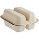 A white World Centric compostable fiber clamshell container with two compartments.