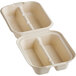 A World Centric compostable fiber taco container with two compartments.