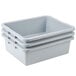 A stack of three Rubbermaid gray polyethylene utility bins.