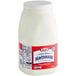 A white Kraft container of mayonnaise with a red label.