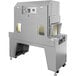 A Sealer Sales stainless steel shrink tunnel machine with wheels.