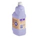 A purple Swiffer WetJet wood floor cleaner solution refill container with a label.