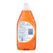 A close-up of a white bottle of Dawn Ultra Antibacterial Orange dish soap with a white label.