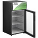 An Avantco black countertop display refrigerator with a green door.