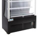 An Avantco black refrigerated air curtain merchandiser with a clear glass door.