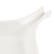 A white plate with a curved edge.