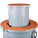 A grey Thermaco Trapzilla extension collar and adapter lid for a grey cylinder with an orange lid.