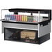 A Turbo Air drop-in refrigerated display case with a variety of energy drinks inside.