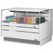 A white Turbo Air horizontal refrigerated curtain merchandiser with drinks inside.