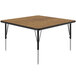 A square Correll activity table with black metal legs.