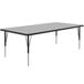 A Correll rectangular table with a gray granite top and black legs.