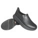 A pair of black Women's SR Comfort slip-on shoes with a black sole.