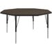 A walnut octagon activity table with metal legs.