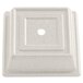 An antique parchment square plate cover with a white circle in the middle.