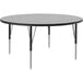 A Correll round activity table with metal legs and a gray granite top.