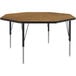 A Correll activity table with a wooden surface and black legs.