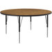 A Correll round activity table with a medium oak top and black metal legs.