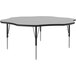 A hexagon shaped Correll activity table with a gray and black top.