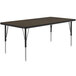 A rectangular Correll activity table with metal legs and a walnut top.