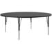 A black round Correll activity table with metal legs.