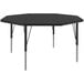 A black hexagon shaped Correll activity table with adjustable silver legs.