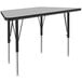 A grey and black rectangular Correll activity table with an adjustable height trapezoid grey granite top.
