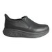 A black Women's Skechers slip on shoe with a thick sole.