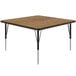 A square Correll activity table with metal legs.