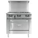 A stainless steel Garland commercial gas range with a griddle, burners, and storage.