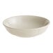 An Acopa Condesa warm gray scalloped porcelain fruit dish.