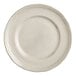 An Acopa Condesa white porcelain plate with a scalloped white border.