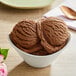 A bowl of Oringer coffee-flavored ice cream with a spoon.