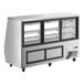 An Avantco stainless steel deli case with glass doors.