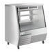 An Avantco stainless steel refrigerated display case with glass doors.