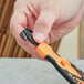 A hand using a Klever X-Change narrow head blade.