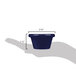 A hand holding a small blue Thunder Group smooth melamine ramekin.