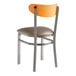 A Lancaster Table & Seating Boomerang chair with a cherry wood back and taupe vinyl seat.