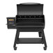 A black Louisiana Grills barbecue with a handle and digital display.