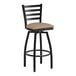 A Lancaster Table & Seating black ladder back swivel bar stool with taupe vinyl cushion.