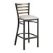 A Lancaster Table & Seating distressed copper metal ladder back bar stool with a light gray vinyl padded seat.