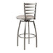 A Lancaster Table & Seating swivel bar stool with a light gray cushion.