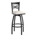 A black metal bar stool with a cross back design and a light gray vinyl padded seat.