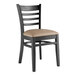 A Lancaster Table & Seating black wood dining chair with taupe vinyl cushion.