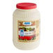 A white plastic AAK Select Recipe Salad Dressing container with a red lid and label.