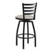 A black Lancaster Table & Seating bar stool with a light gray cushion.