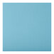 A close-up of a blue vinyl padded seat on a Lancaster Table & Seating swivel bar stool.