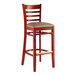 A mahogany wooden Lancaster Table & Seating ladder back bar stool with a taupe cushion.