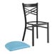 A Lancaster Table & Seating black cross back chair with a blue vinyl padded seat.