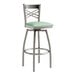 A Lancaster Table & Seating clear coat metal cross back swivel bar stool with a seafoam vinyl padded seat.