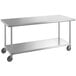 A Regency stainless steel work table with undershelf and casters.